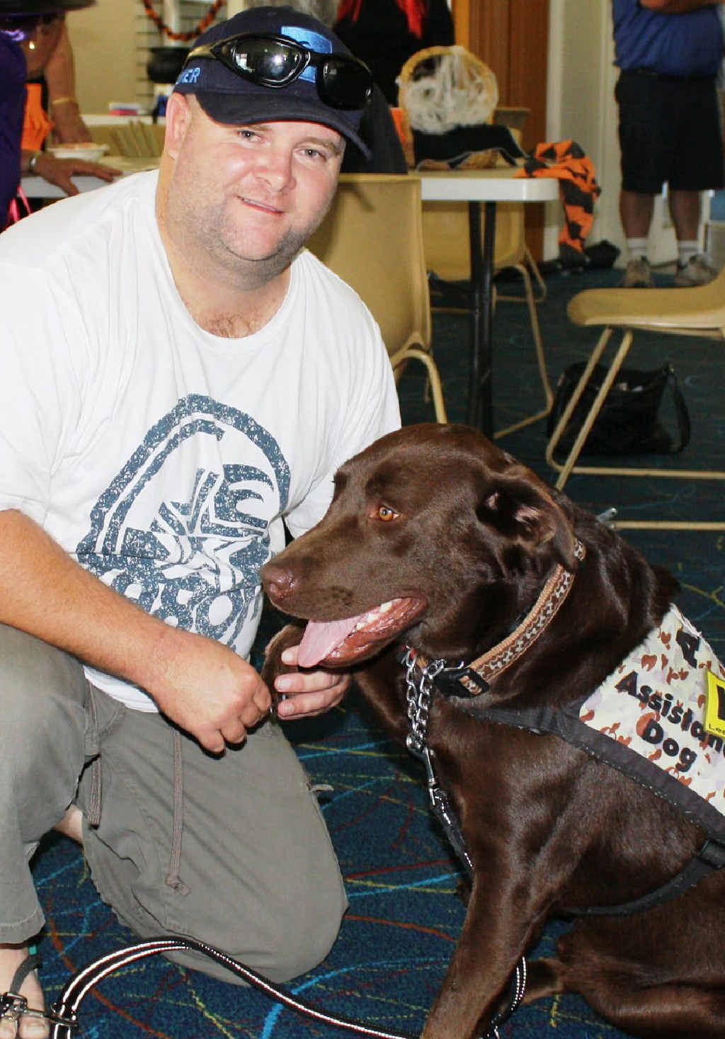 PET THERAPY: Ian Rawson with his best mate Charlie at the Laidley Day Club meeting. PET THERAPY: Ian Rawson with his best mate Charlie at the Laidley Day Club meeting.