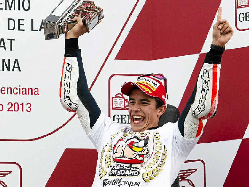 PARTY TIME: Spanish rider Marc Marquez celebrates becoming world champion. PARTY TIME: Spanish rider Marc Marquez celebrates becoming world champion.