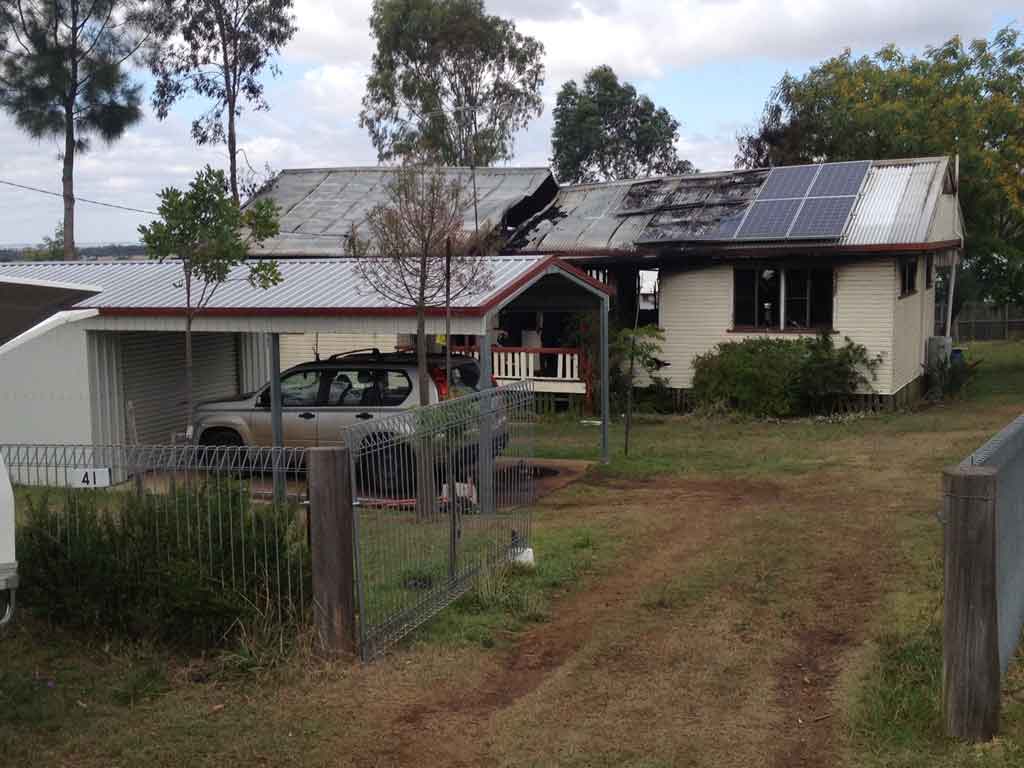 Investigators have arrived at the scene of last night's fatal house fire in Goombungee. Investigators have arrived at the scene of last night's fatal house fire in Goombungee.