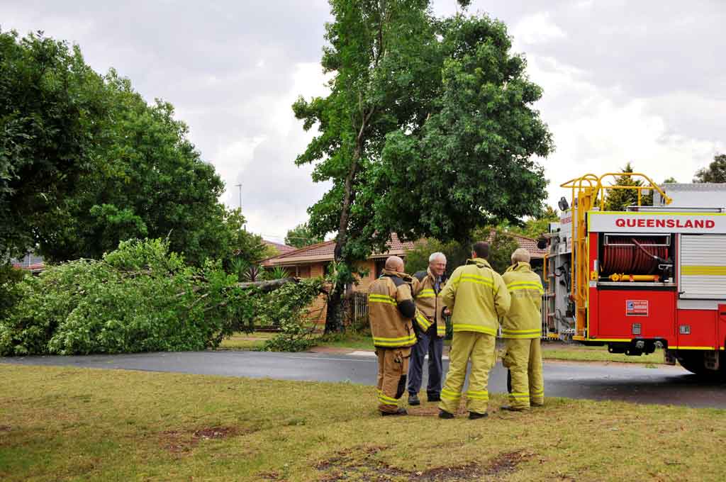 Emergency services in Hume St, Toowoomba, where powerlines and trees have been brought down by this afternoon's wild storms. Emergency services in Hume St, Toowoomba, where powerlines and trees have been brought down by this afternoon's wild storms.