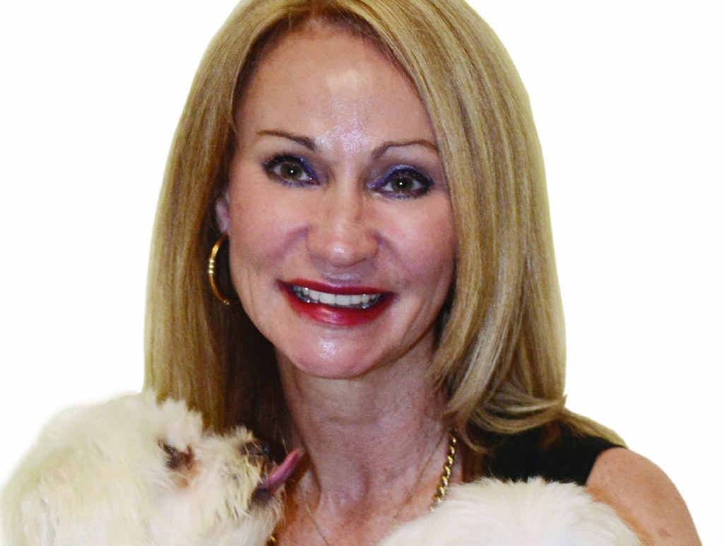 TOP 90: Rockhampton’s Cooke Property agent Annette Waddell and her dogs. TOP 90: Rockhampton’s Cooke Property agent Annette Waddell and her dogs.