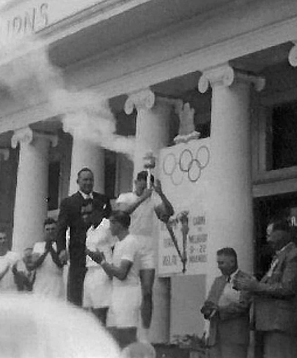 THE RELAY BEGINS: Con Verevis, from Cairns, sets out on the first leg of the 1956 Olympic torch relay. THE RELAY BEGINS: Con Verevis, from Cairns, sets out on the first leg of the 1956 Olympic torch relay.
