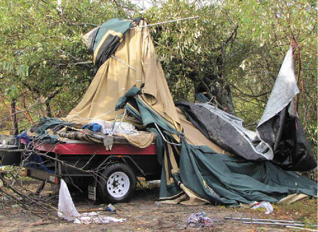 A camper trailer is blown over on Inskip Point.RIGHT: A four wheel drive and tent campsite is destroyed in the fierce storm at Inskip. A camper trailer is blown over on Inskip Point.RIGHT: A four wheel drive and tent campsite is destroyed in the fierce storm at Inskip.