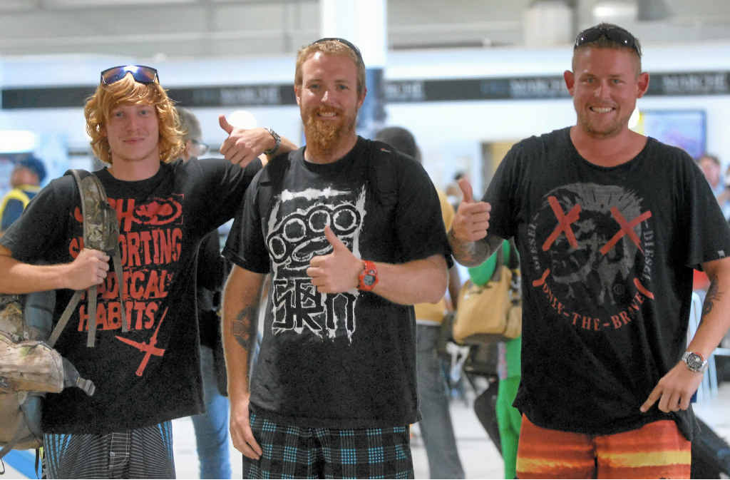 Corey Laffin (left), Shane Martin and Brad Heron (right) are all smiles as they return to Mackay after narrowly escaping the wrath of Typhoon Haiyan during a kite surfing trip to the Philippines. Corey Laffin (left), Shane Martin and Brad Heron (right) are all smiles as they return to Mackay after narrowly escaping the wrath of Typhoon Haiyan during a kite surfing trip to the Philippines.