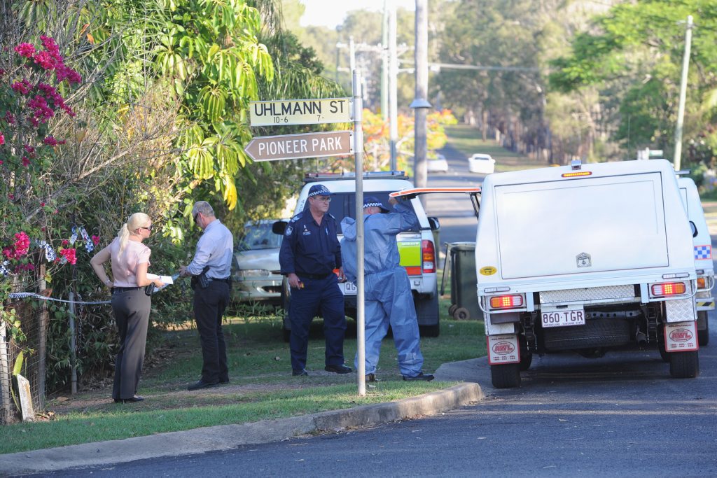Police and forensic officers at a house on the corner of Uhlmann St and Woongool Rd, Tinana. Police and forensic officers at a house on the corner of Uhlmann St and Woongool Rd, Tinana.