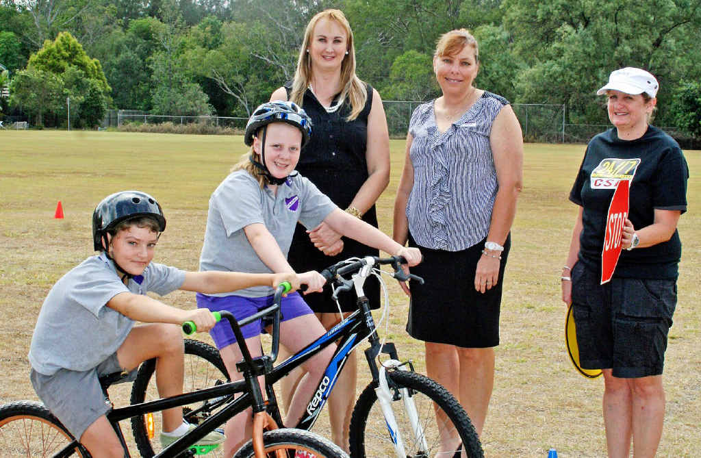 SAFE RIDING: (From back left) Ipswich City Council City Infrastructure Committee chairwoman Cr Cheryl Bromage, Churchill State School Principal Jodie Jones, Sue Miles from the 24/7 Cycling Safety Fund and Churchill State School students (from front left) Aaron Hill and Madisyn Griffiths. SAFE RIDING: (From back left) Ipswich City Council City Infrastructure Committee chairwoman Cr Cheryl Bromage, Churchill State School Principal Jodie Jones, Sue Miles from the 24/7 Cycling Safety Fund and Churchill State School students (from front left) Aaron Hill and Madisyn Griffiths.