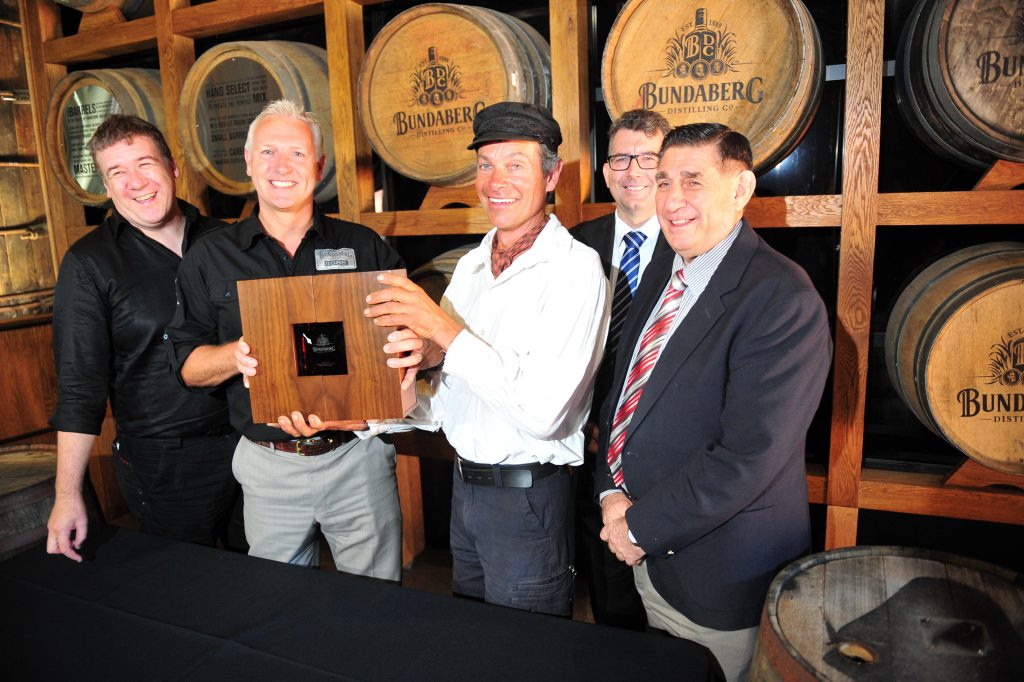 TOP DROP: Graham Wrigglesworth, David Halliday, Marty Woods, Keith Pitt and Mal Forman with the 125th Anniversary Rum. Photo: Max Fleet / NewsMail TOP DROP: Graham Wrigglesworth, David Halliday, Marty Woods, Keith Pitt and Mal Forman with the 125th Anniversary Rum. Photo: Max Fleet / NewsMail