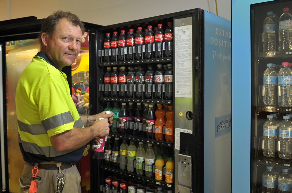 BUSINESS FIZZING: Michael Watson increased the turnover of his two-day-a-week vending machine business by 170%, seen here stocking up Stockland for Christmas. BUSINESS FIZZING: Michael Watson increased the turnover of his two-day-a-week vending machine business by 170%, seen here stocking up Stockland for Christmas.