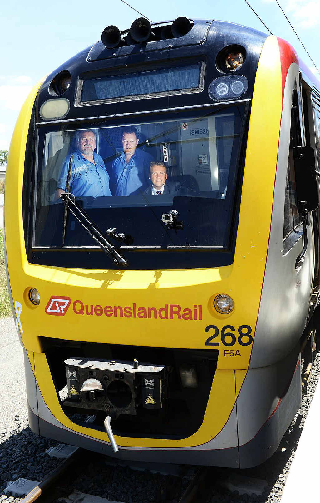 ALL ABOARD: QR trainers Peter Cherry and Troy Prebble with Minister for Transport and Main Roads Scott Emerson on board the first train to Springfield Central on Wednesday. ALL ABOARD: QR trainers Peter Cherry and Troy Prebble with Minister for Transport and Main Roads Scott Emerson on board the first train to Springfield Central on Wednesday.