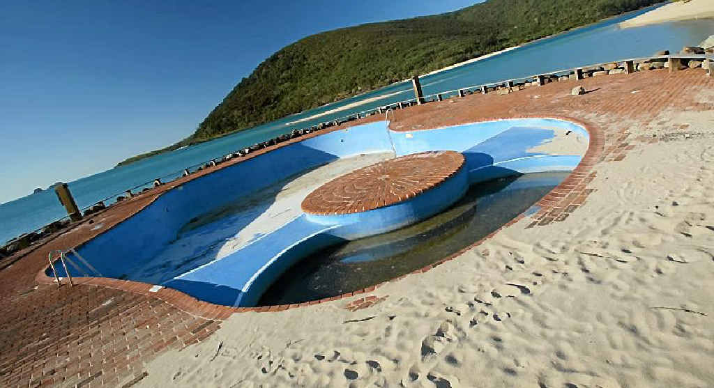 The Brampton Island pool hasn’t been used for swimming for some time. The Brampton Island pool hasn’t been used for swimming for some time.