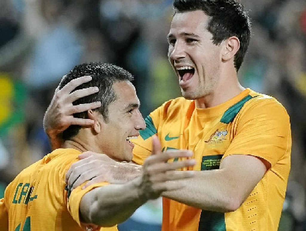 WINNERS ARE GRINNERS: Australia’s Ryan McGowan, right, congratulates Tim Cahill after the striker’s goal last night against Costa Rica in Sydney. WINNERS ARE GRINNERS: Australia’s Ryan McGowan, right, congratulates Tim Cahill after the striker’s goal last night against Costa Rica in Sydney.