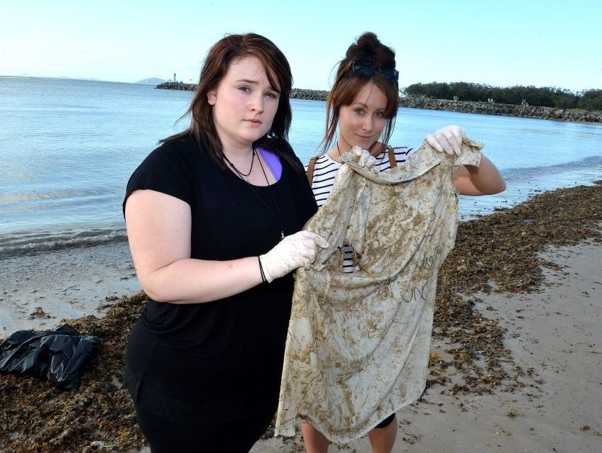 Samantha Dawe and Anita Elliston have been picking up discarded school clothes on Mooloolaba Beach after recent celebrations. Samantha Dawe and Anita Elliston have been picking up discarded school clothes on Mooloolaba Beach after recent celebrations.