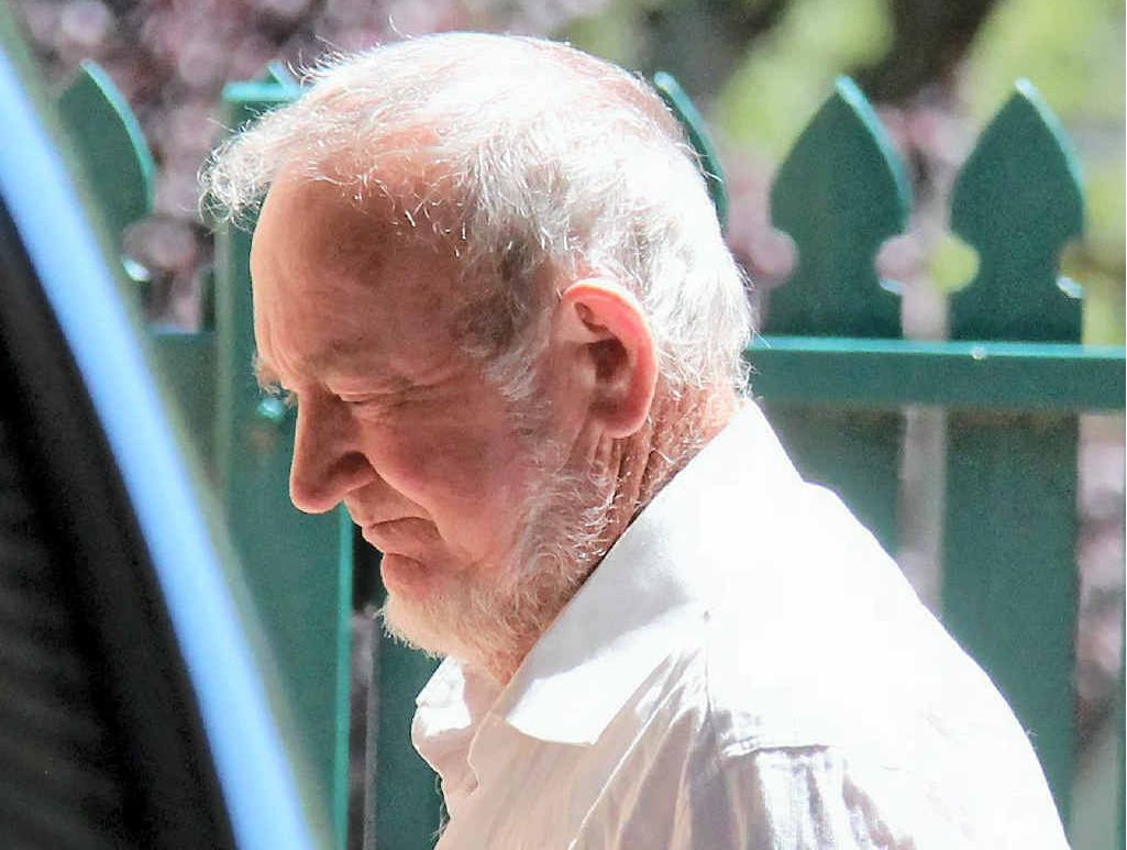 Bill Lynam walks from the watchhouse into the Warwick Magistrates Court. Bill Lynam walks from the watchhouse into the Warwick Magistrates Court.