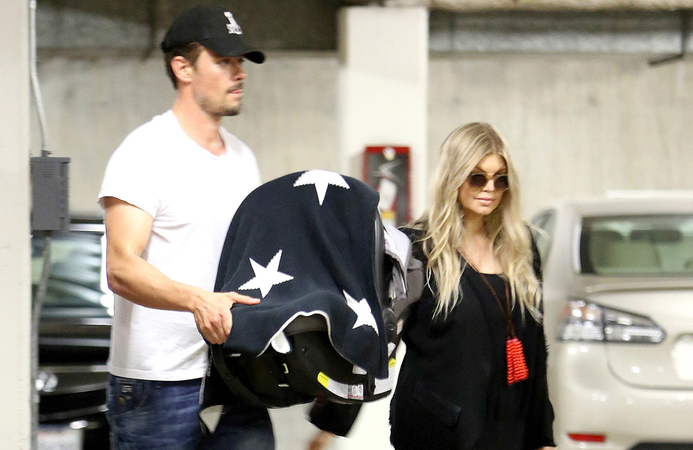 Fergie and Josh Duhamel. Fergie and Josh Duhamel.