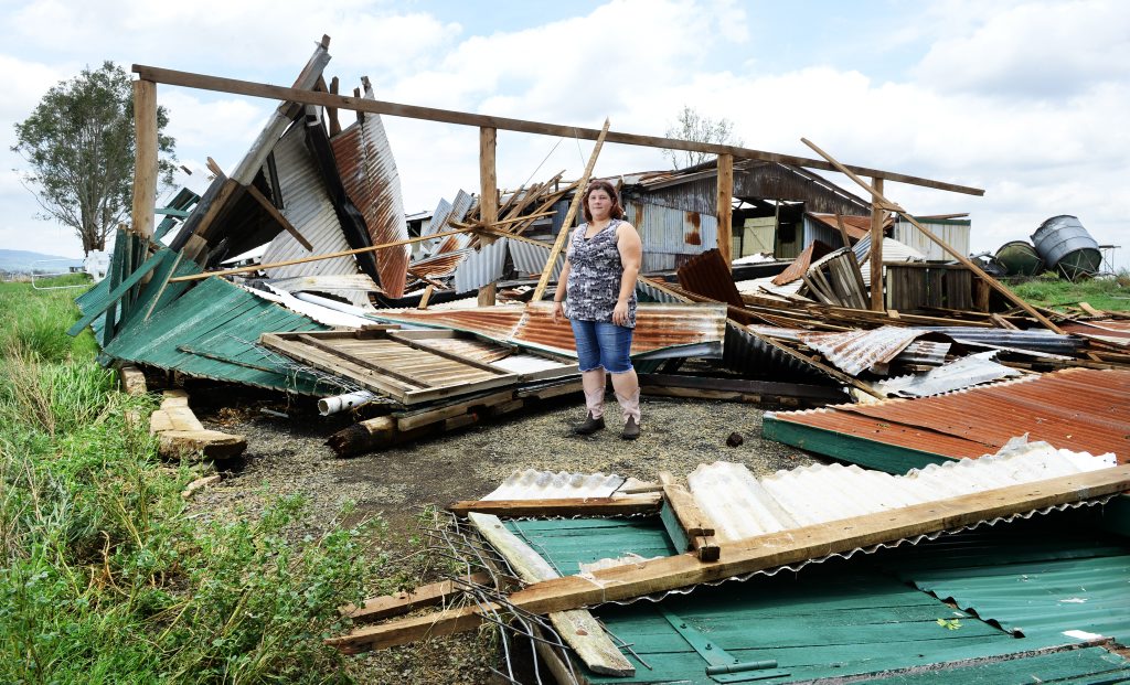 TORN APART: Shiralee Winslade inspects the damage to a shed in Lower Mt Walker after storms on Saturday night. TORN APART: Shiralee Winslade inspects the damage to a shed in Lower Mt Walker after storms on Saturday night.