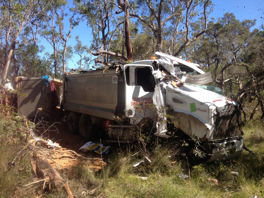 Owner/driver Stan Arnott's truck is a little worse for wear after this morning's Pacific Highway crash at Halfway Creek. Photo JoJo Newby / Daily Examiner Owner/driver Stan Arnott's truck is a little worse for wear after this morning's Pacific Highway crash at Halfway Creek. Photo JoJo Newby / Daily Examiner