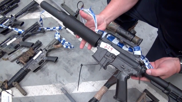 Police uncovered one of the largest holdings of illegal firearms, military style weapons, and ammunition in Queensland following an extended search of a property in Monto. Police uncovered one of the largest holdings of illegal firearms, military style weapons, and ammunition in Queensland following an extended search of a property in Monto.