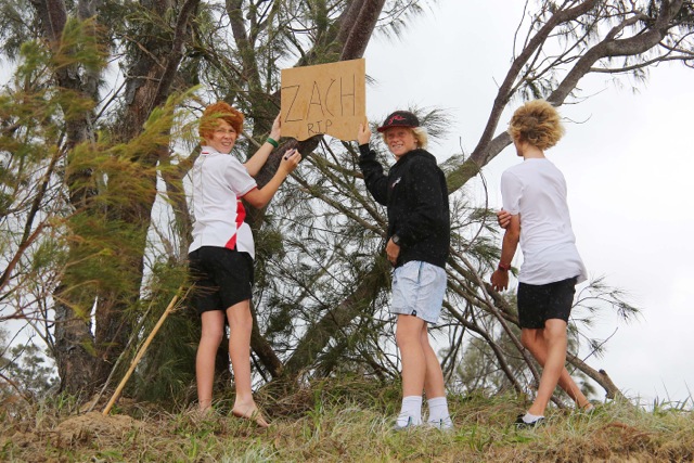 Jack Parker (left) was first to raise the alarm and was back at Campbell's Beach today with friends to organise a memorial tribute to Zach Young. Jack Parker (left) was first to raise the alarm and was back at Campbell's Beach today with friends to organise a memorial tribute to Zach Young.
