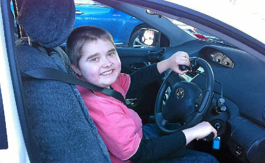 HIGH-BEAM GRIN: MacKinley Brisbane was thrilled after his first driving lesson. HIGH-BEAM GRIN: MacKinley Brisbane was thrilled after his first driving lesson.