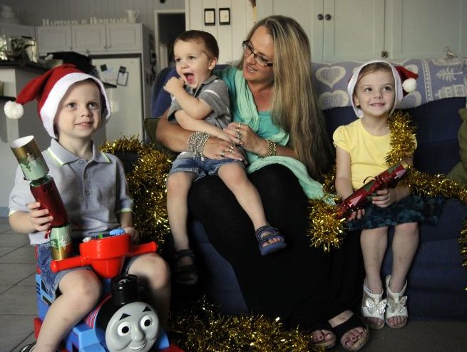 At home with three of her children -Jeni Bonell has to buy Christmas presents for 15 children.From left; Eric, 3 years, Damian, 2 years and Rachel 5 years. Photo: Bev Lacey / The Chronicle At home with three of her children -Jeni Bonell has to buy Christmas presents for 15 children.From left; Eric, 3 years, Damian, 2 years and Rachel 5 years. Photo: Bev Lacey / The Chronicle