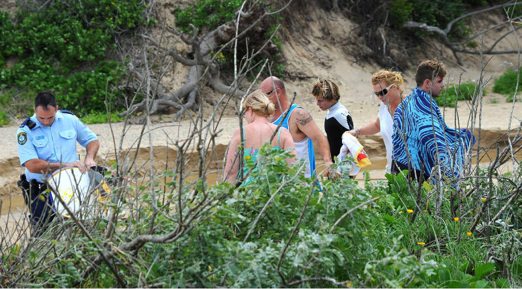 SURFING DANGER: Police on the scene after a fatal shark attack at Campbells Beach near Coffs Harbour. SURFING DANGER: Police on the scene after a fatal shark attack at Campbells Beach near Coffs Harbour.