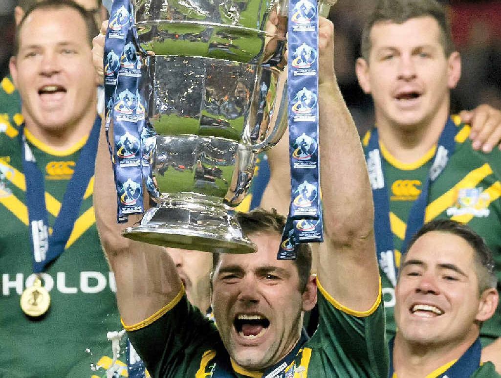 CELEBRATION: Australia captain Cameron Smith lifts the Rugby League World Cup trophy. CELEBRATION: Australia captain Cameron Smith lifts the Rugby League World Cup trophy.