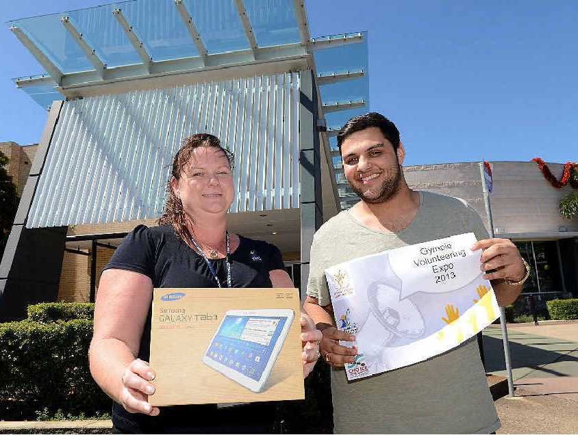 Kara Tebbit and Murray Birchall show off the Samsung Galaxy Tab 3 up for grabs at the Volunteer Expo at the Civic Centre on Friday.