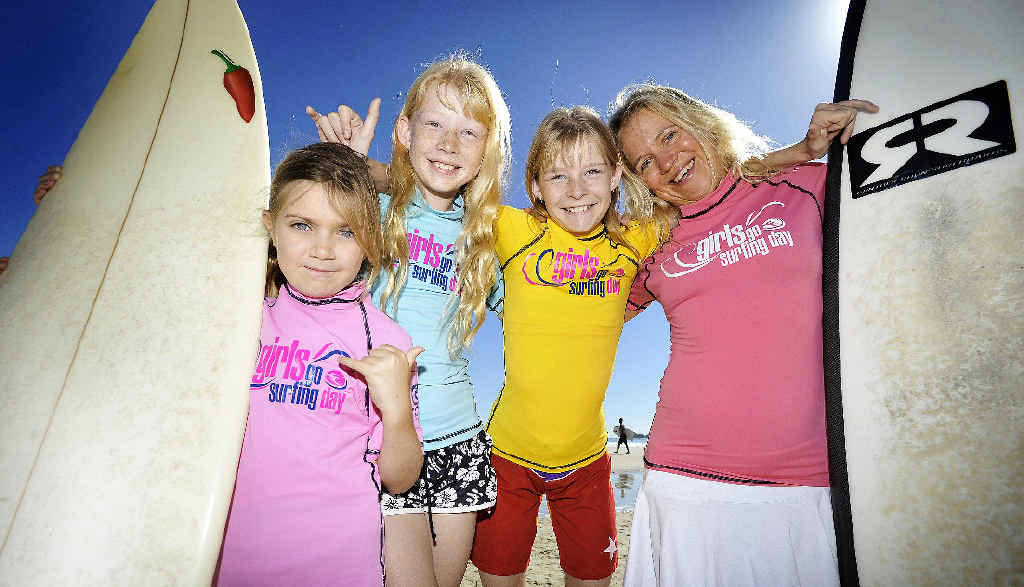 COOL KIDS: Mahia Adams, 8, Courtney and Tayla Slater, 11 and surf coach Karin Ochsner getting ready for the Girls Go Surfing day next weekend. STORY PAGE 2 COOL KIDS: Mahia Adams, 8, Courtney and Tayla Slater, 11 and surf coach Karin Ochsner getting ready for the Girls Go Surfing day next weekend. STORY PAGE 2