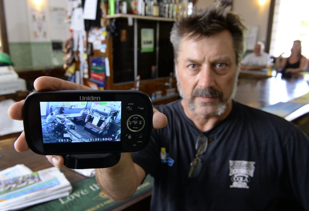 CAUGHT ON CAMERA: Publican Darren Riley with his security monitor. CAUGHT ON CAMERA: Publican Darren Riley with his security monitor.