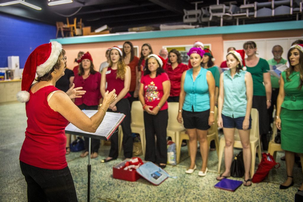 Members of the Company of Voices group, conducted by Jenny Garret, rehearse for the upcoming Mayor's Carols by Candlelight event. Members of the Company of Voices group, conducted by Jenny Garret, rehearse for the upcoming Mayor's Carols by Candlelight event.