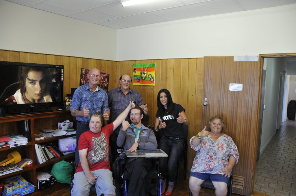 Warrina Services are all smiles after they are given a free Foxtel Subscription from Telstra. (Left to right)Adrian Colley, Kevin Schreck, Robert Fernandez, Chris O'Shea, Marisol Amos, Dianne Gavan. Photo Nick Houghton / The Chronicle