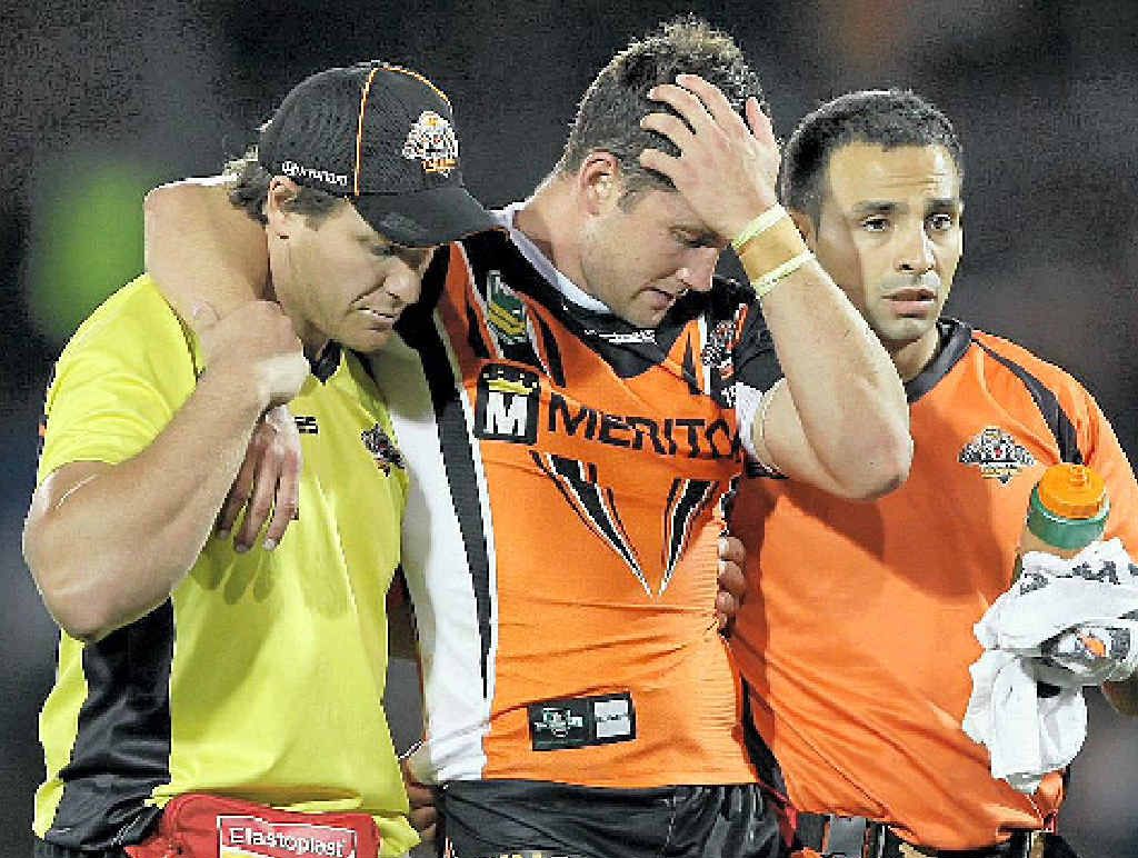 FLASHBACK: Tim Moltzen (centre) leaves the field injured during the game against the Brisbane Broncos earlier this year. FLASHBACK: Tim Moltzen (centre) leaves the field injured during the game against the Brisbane Broncos earlier this year.