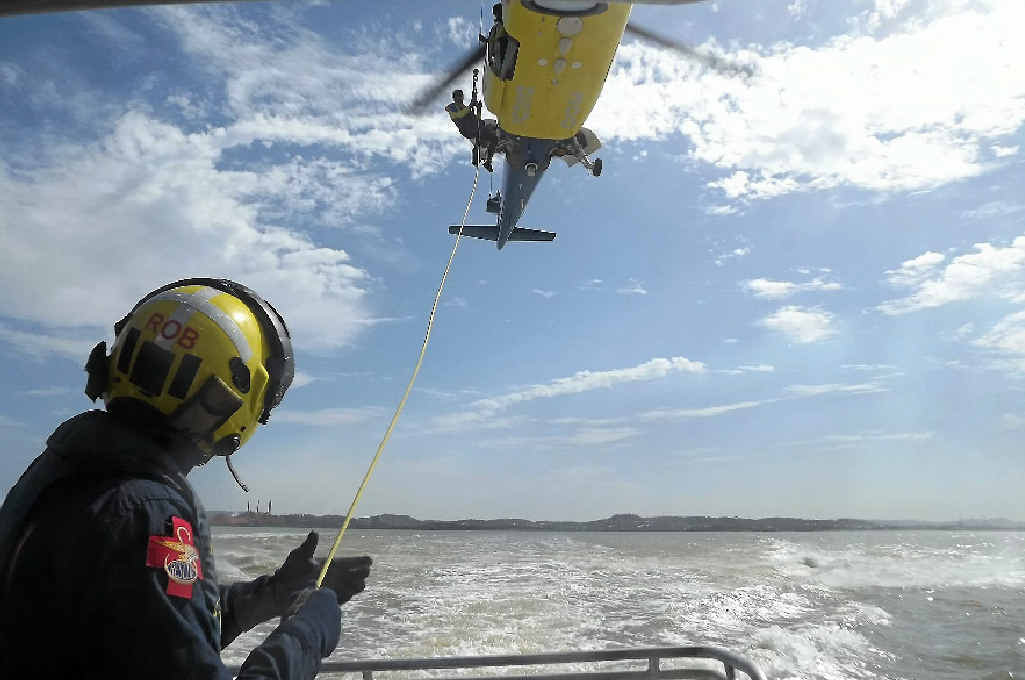 RACQ Capricorn Helicopter Rescue stages a water emergency at Gladstone Harbour. RACQ Capricorn Helicopter Rescue stages a water emergency at Gladstone Harbour.