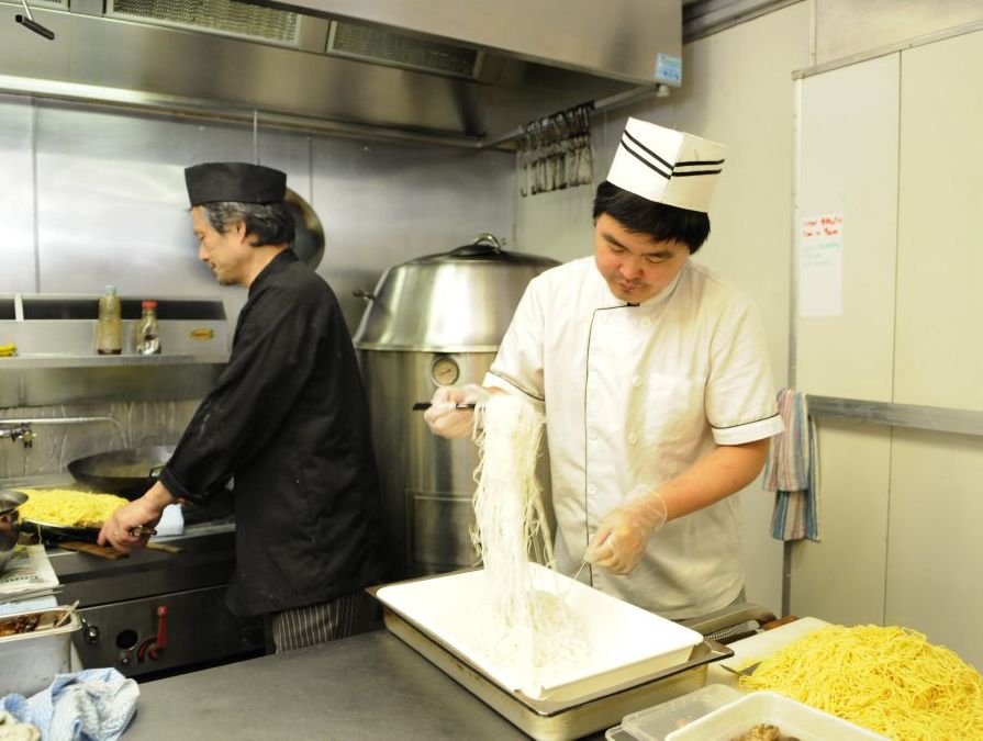 Qi'lin Oriental Cuisine Restaurant in the Hooper Cetnre. Head Chef & Manager, Stanley Poon (left) and chef Feng bin Chang. Photo: Bev Lacey / The Chronicle Qi'lin Oriental Cuisine Restaurant in the Hooper Cetnre. Head Chef & Manager, Stanley Poon (left) and chef Feng bin Chang. Photo: Bev Lacey / The Chronicle