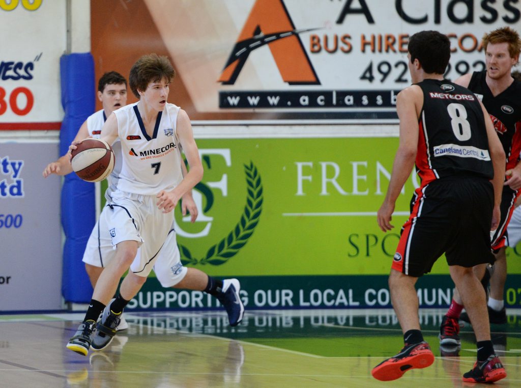 Image for sale: Jared Blanchard takes the ball up court for the Woolam U23 Rockets in their basketball game against Mackay at Hegvold Stadium. Photo: Chris Ison / The Morning Bulletin