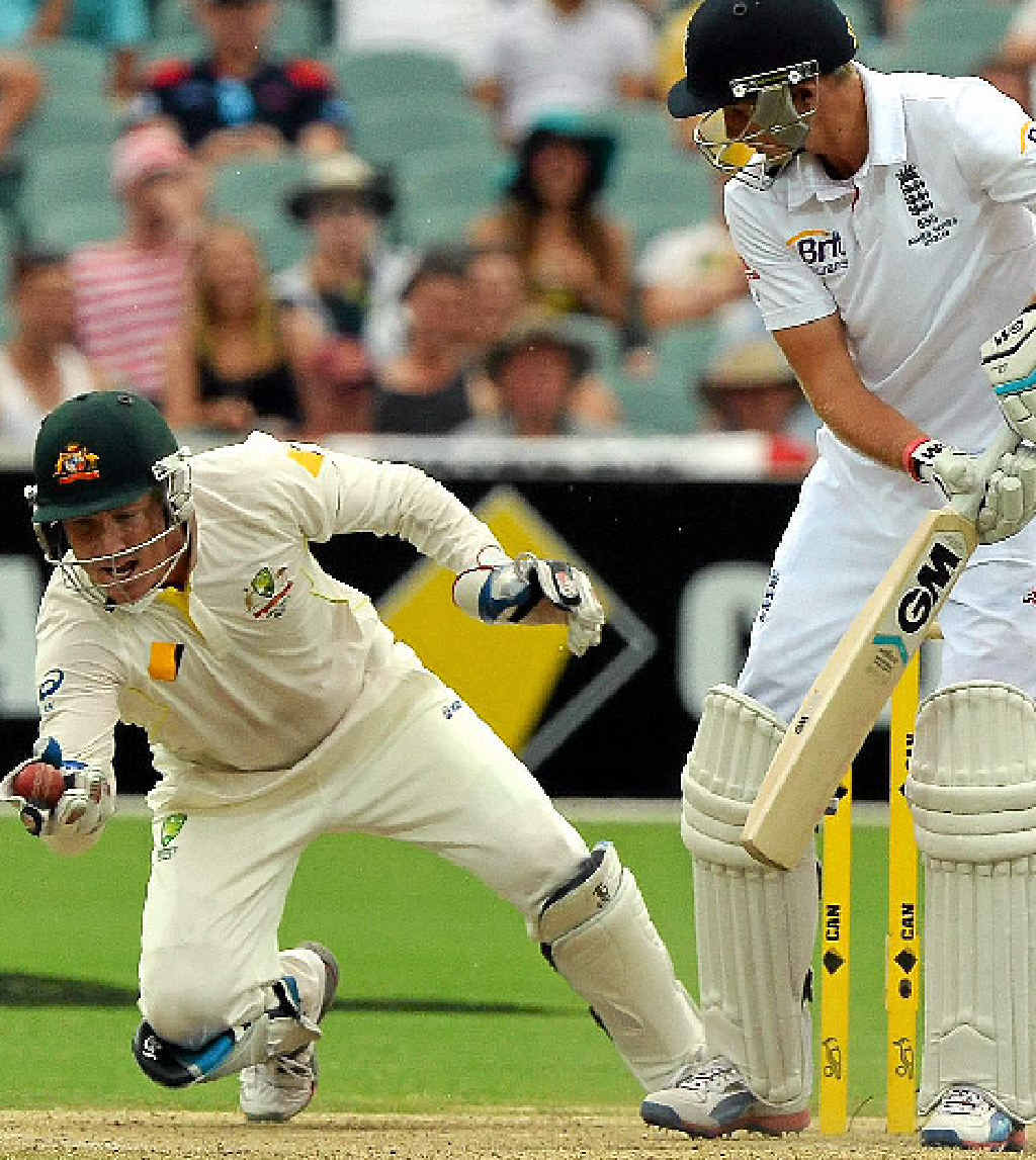 KEY WICKET: Brad Haddin dives to catch Joe Root for 87 at Adelaide Oval yesterday to complete 200 catches in Test cricket. KEY WICKET: Brad Haddin dives to catch Joe Root for 87 at Adelaide Oval yesterday to complete 200 catches in Test cricket.