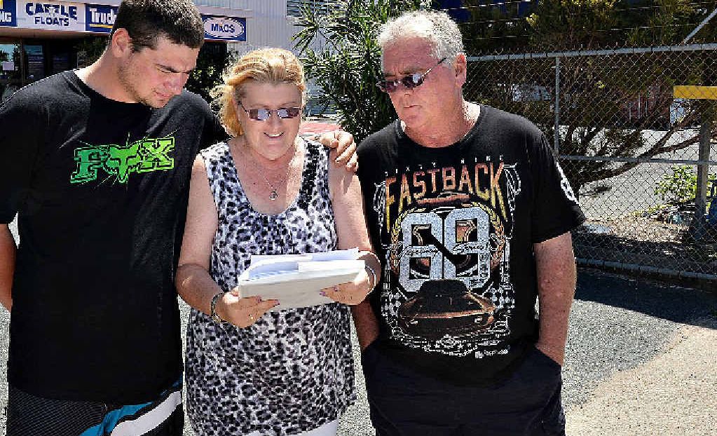 Chris Fredrickson, his wife Judi and son Dean, outside MACS Engineering yesterday, say they feel let down by a federal law that will leave the family about $34,000 out of pocket. Chris Fredrickson, his wife Judi and son Dean, outside MACS Engineering yesterday, say they feel let down by a federal law that will leave the family about $34,000 out of pocket.