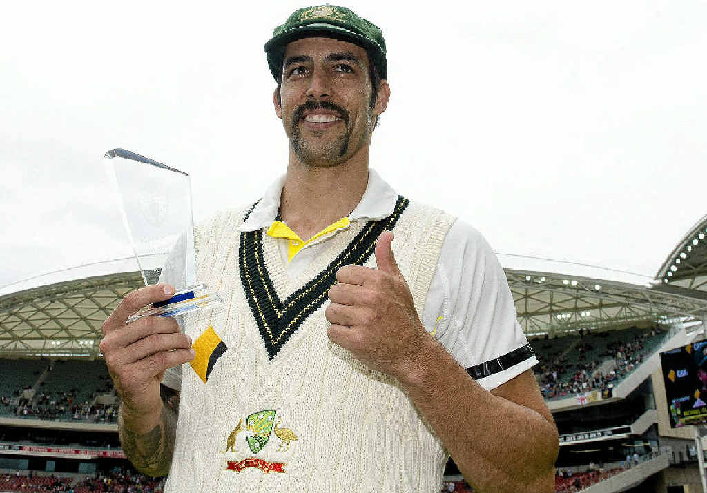 TOP PLAYER: Australian speedster Mitchell Johnson celebrates his man-of-the-match award yesterday after the second Test win over England on day five at Adelaide Oval. TOP PLAYER: Australian speedster Mitchell Johnson celebrates his man-of-the-match award yesterday after the second Test win over England on day five at Adelaide Oval.