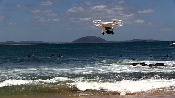 Eye in the sky: quadcopter capturing footage of surfers at Point Cartwright, Sunshine Coast. Eye in the sky: quadcopter capturing footage of surfers at Point Cartwright, Sunshine Coast.