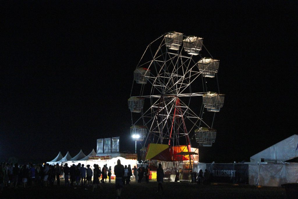 Ferris Wheel at the Byron Bluesfest 2010 with missing a carriage after the carriage fell off the ride. Ferris Wheel at the Byron Bluesfest 2010 with missing a carriage after the carriage fell off the ride.