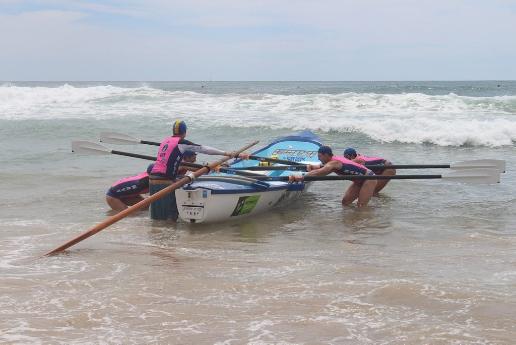 Tannum Sands surf crew the 'Hellfish' gearing up to start a race. Photo Contributed Tannum Sands surf crew the 'Hellfish' gearing up to start a race. Photo Contributed