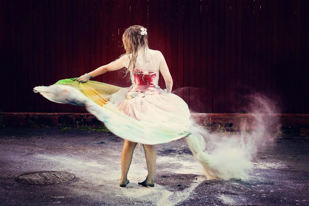Newlywed Mel Long gets messy in her wedding dress. Newlywed Mel Long gets messy in her wedding dress.