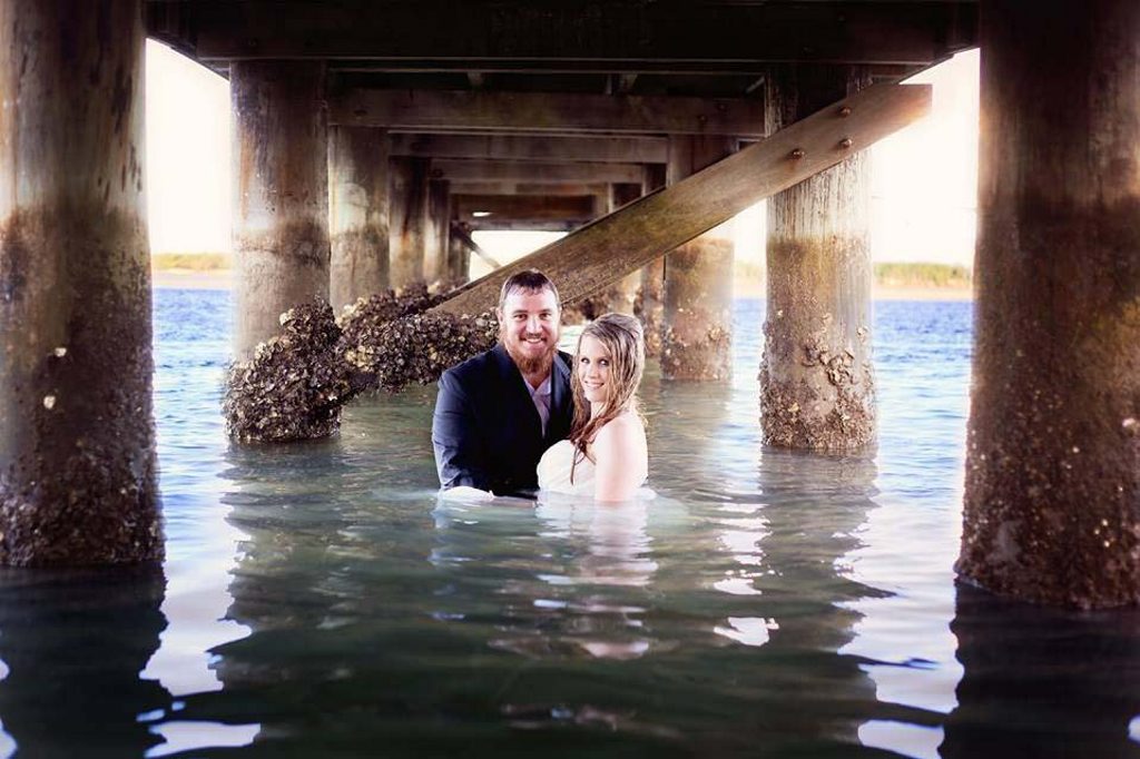 Mel and Jeremy Long took a dive on their trash the dress photo shoot. Mel and Jeremy Long took a dive on their trash the dress photo shoot.