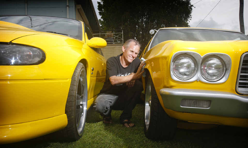 SHEEN DULLED: Holden fancier Jamie Ferguson of South Grafton gives his VT SS Commodore and ’74 HQ Holden a polish despite the disappointing news of Holden’s decision to end Australian manufacturing. SHEEN DULLED: Holden fancier Jamie Ferguson of South Grafton gives his VT SS Commodore and ’74 HQ Holden a polish despite the disappointing news of Holden’s decision to end Australian manufacturing.
