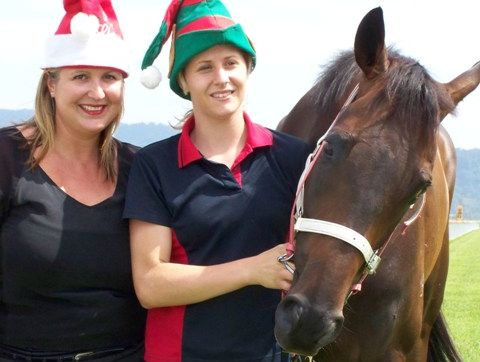Jockey club secretary-manager Rachael Elliott and local trackwork-rider Isabella Rabjones with runner Persian Book (trained by Darren Graham at Murwillumbah). Jockey club secretary-manager Rachael Elliott and local trackwork-rider Isabella Rabjones with runner Persian Book (trained by Darren Graham at Murwillumbah).