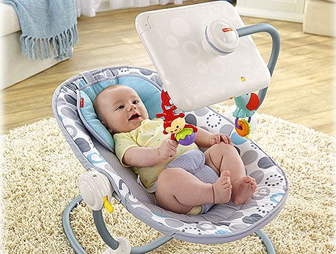Fisher Price's Newborn-to-Toddler Apptivity Seat with iPad dock. Fisher Price's Newborn-to-Toddler Apptivity Seat with iPad dock.