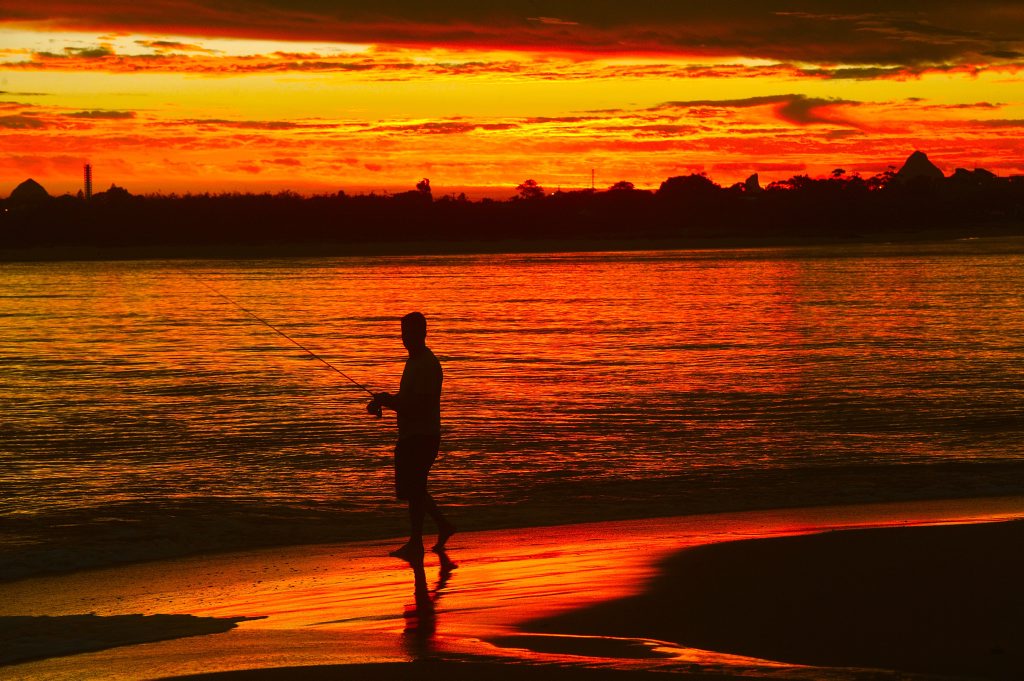 Image for sale: Sunset over Caloundra, Bulcock Beach, Pumicestone Passage looking west to the Glasshouse Mountains. Photo: Warren Lynam / Sunshine Coast Daily