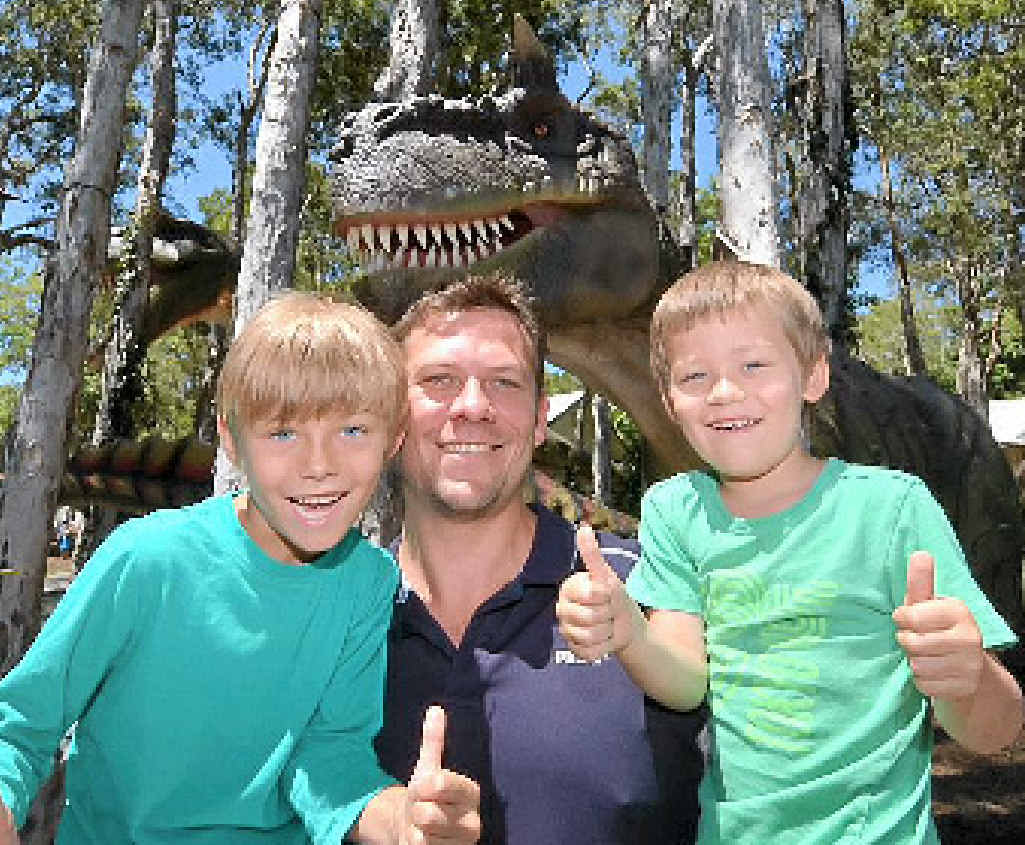 IMPRESSED: Buderim’s Andrew, Ashton and Oliver Johnson give Palmersaurus the thumbs-up. IMPRESSED: Buderim’s Andrew, Ashton and Oliver Johnson give Palmersaurus the thumbs-up.