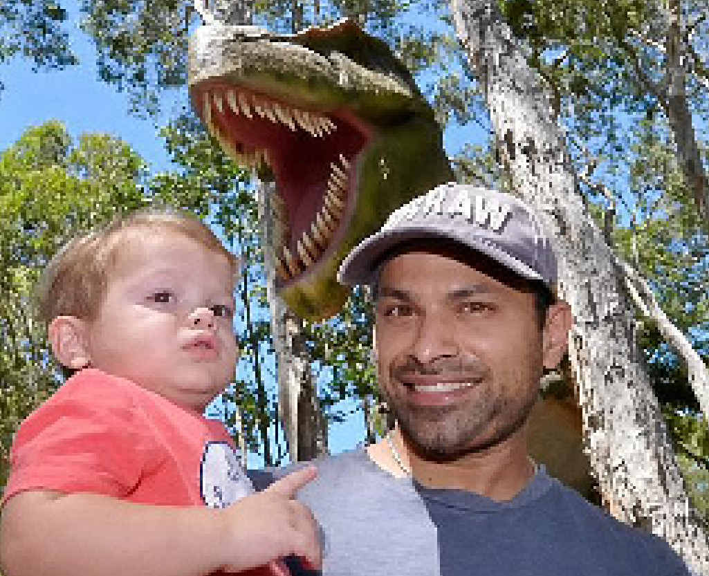 EYE-OPENER: Ranjit Paul gives one-year-old Lincoln an introduction to the world of dinosaurs. EYE-OPENER: Ranjit Paul gives one-year-old Lincoln an introduction to the world of dinosaurs.