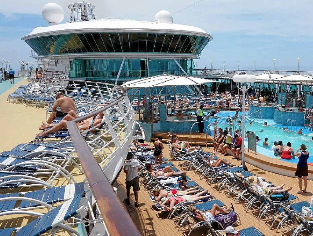 LAZY DAYS: The pool deck on board Rhapsody of the Seas is where much of the action happens. LAZY DAYS: The pool deck on board Rhapsody of the Seas is where much of the action happens.